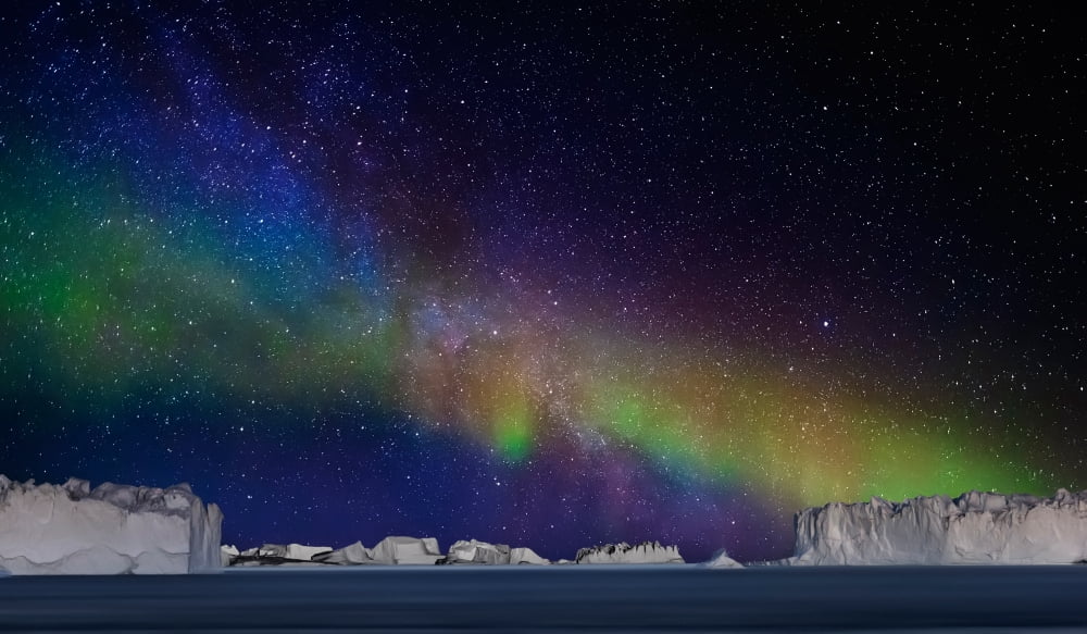 Digital composite - Aurora Borealis or Northern Lights in Iceland and Icebergs in Greenland Canvas Art - Panoramic Images (40 x 24)
