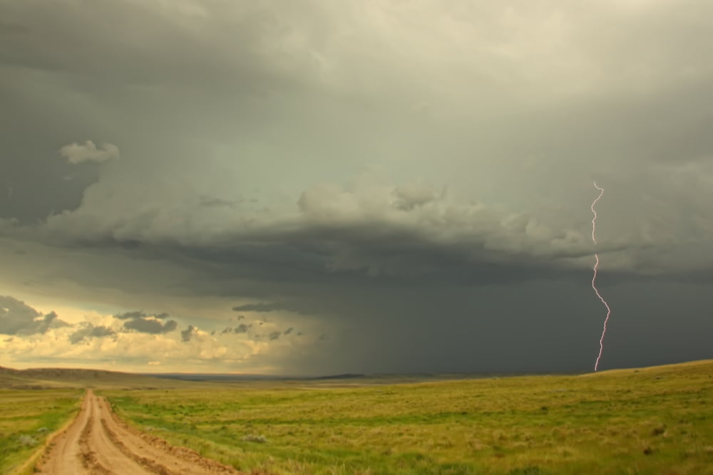 Digitally Enhanced Image With Painterly Effect Of Lightning Striking In Grasslands National Park Saskatchewan Canvas Art - Robert Postma Design Pics (17 x 11)