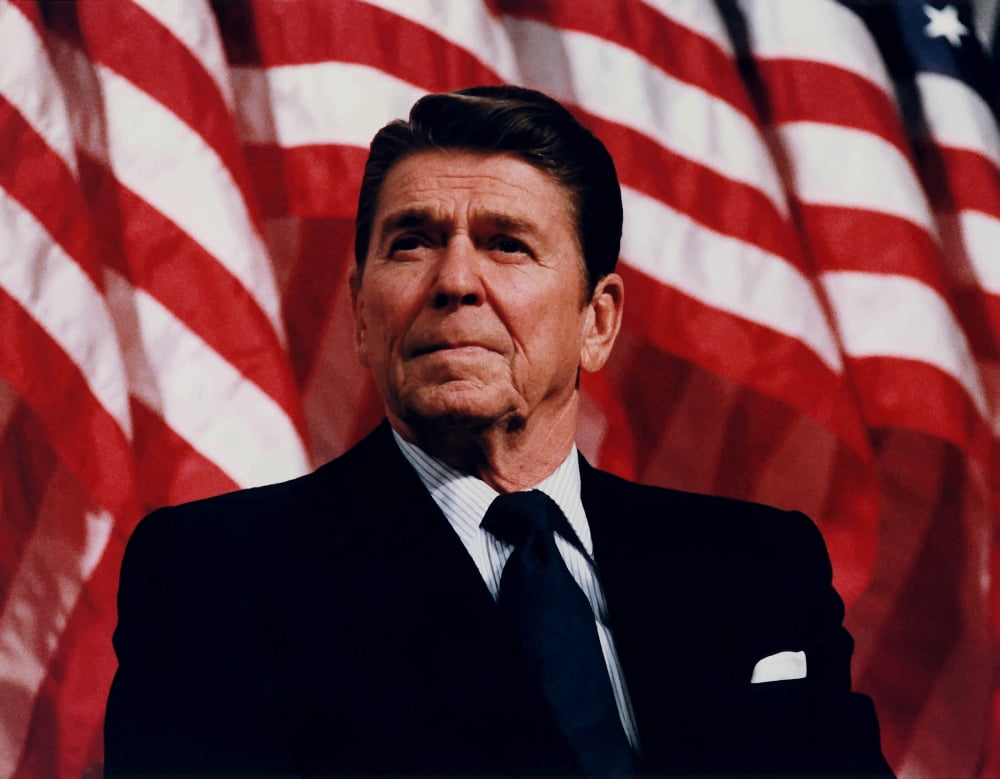 Digitally vector photo of President Ronald Reagan in front of American Flag Canvas Art - John ParrotStocktrek Images (16 x 13)