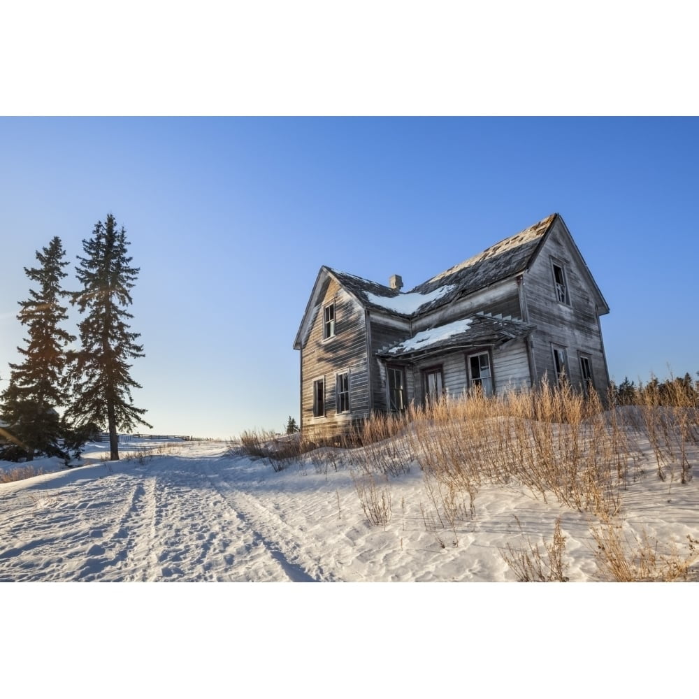 Dilapidated farm house at sunrise in winter near Winnipeg; Manitoba ...