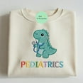 thumbnail image 1 of Dinosaur Pediatrics Nurse Embroidered Sweatshirt, PEDS Shirt, Pads Nurse Dino Sweater, Funny Nurse Graduation Gift for Nurse, Cute Peds gift, 1 of 5