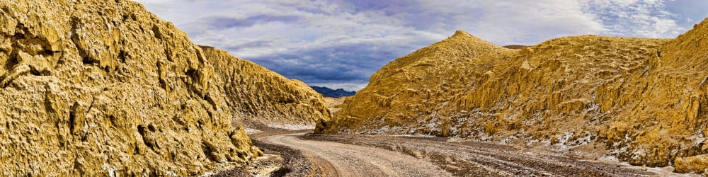 Dirt road passing through a landscape Mustard Canyon Death Valley Death Valley National Park California USA Canvas Art - Panoramic Images (48 x 12)