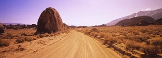 Dirt road passing through an arid landscape Californian Sierra Nevada California USA Canvas Art - Panoramic Images (36 x 13)