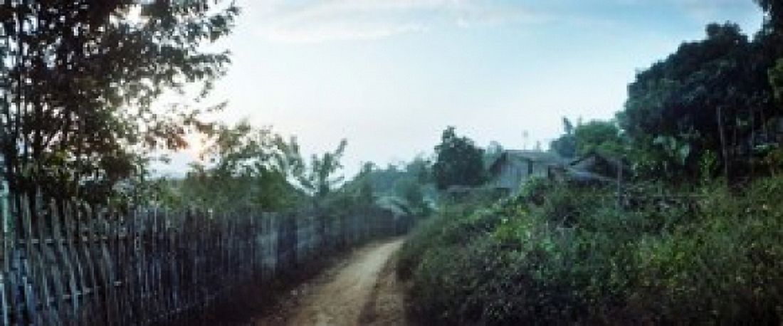 Dirt road passing through an indigenous village Chiang Mai Thailand Canvas Art - Panoramic Images (15 x 6)