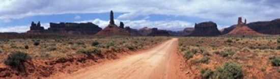 Dirt road through desert landscape with sandstone formations Utah Canvas Art - Panoramic Images (40 x 12)