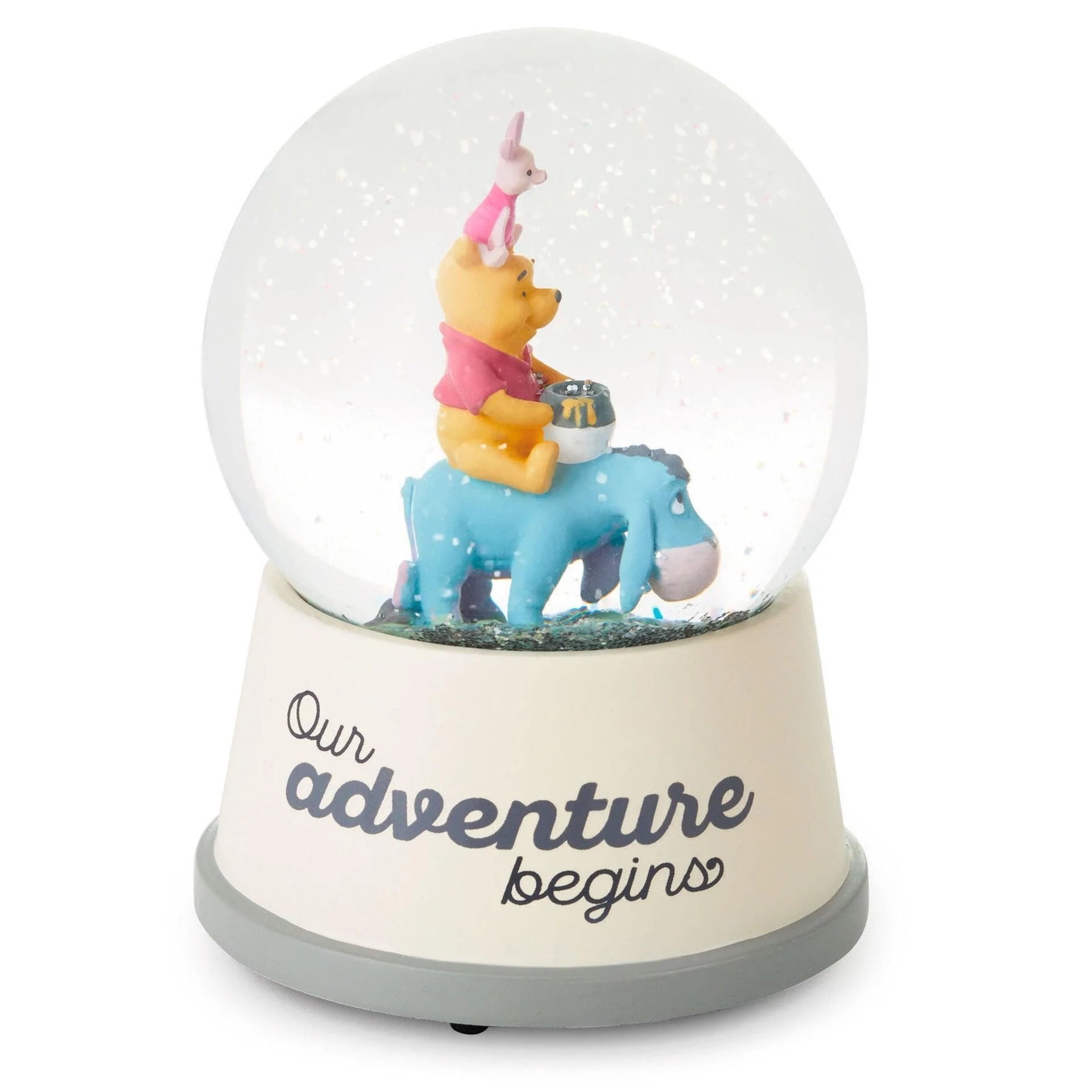 Plastic holiday selling snowglobe. Winny the pooh and snoopy