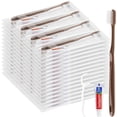 thumbnail image 1 of Disposable toothbrush with toothpaste, travel toothbrush set, individually packaged, brown, with dental floss pick, suitable for hotels, homes, camping, travel (100 pack), 1 of 4