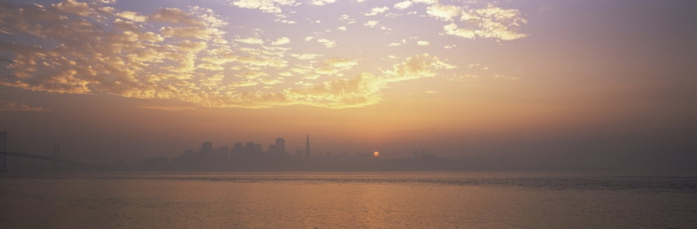 Distant view of a city at dusk San Francisco California USA Canvas Art - Panoramic Images (6 x 18)