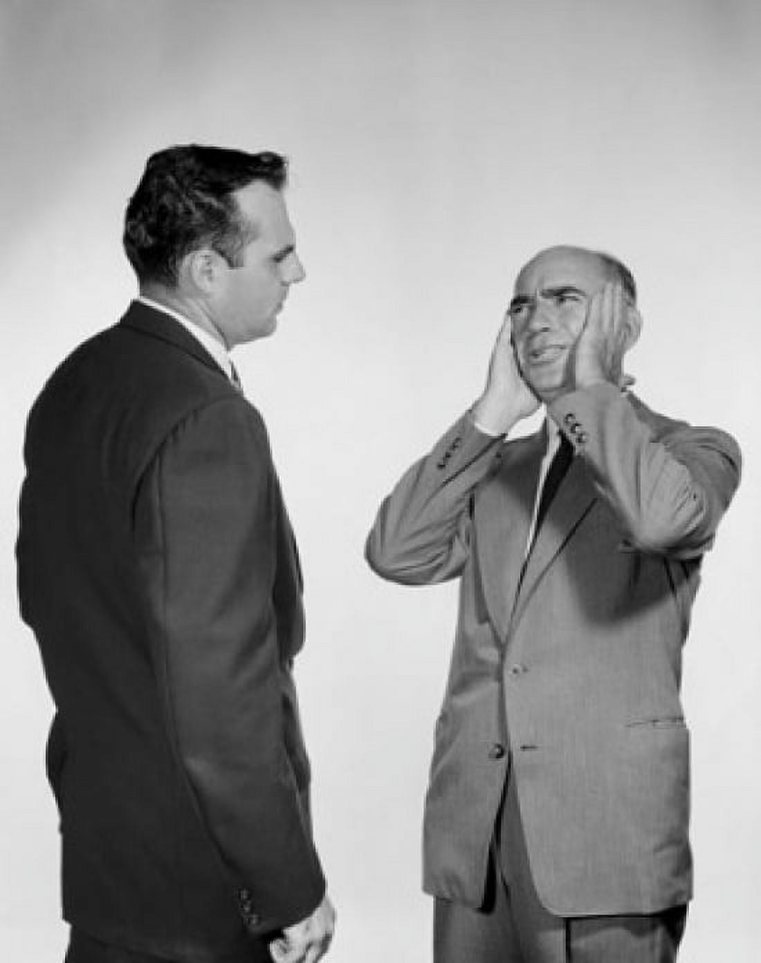 Distraught businessman talking to another businessman Canvas Art - (24 x 36)