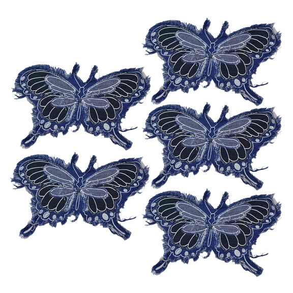 Distressed Denims Sewing On Patches With Butterfly Designs For Garment Upcycling