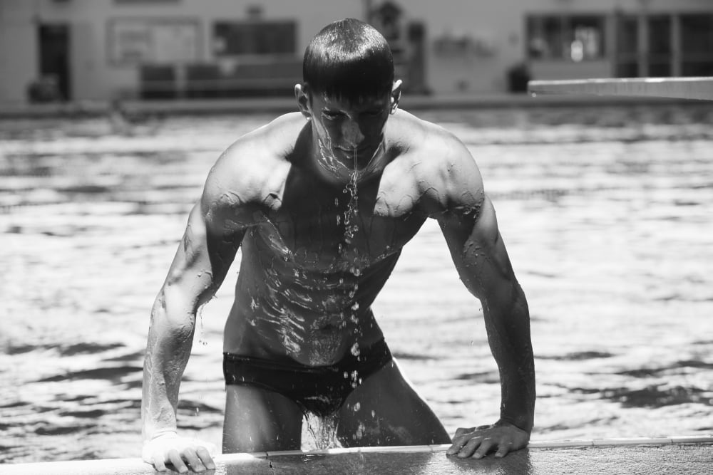 Diver Pulling Himself Out Of The Pool With Water Dripping Off Him Portland Oregon United States of America Canvas Art - Colleen Cahill Design Pics (19 x 12)