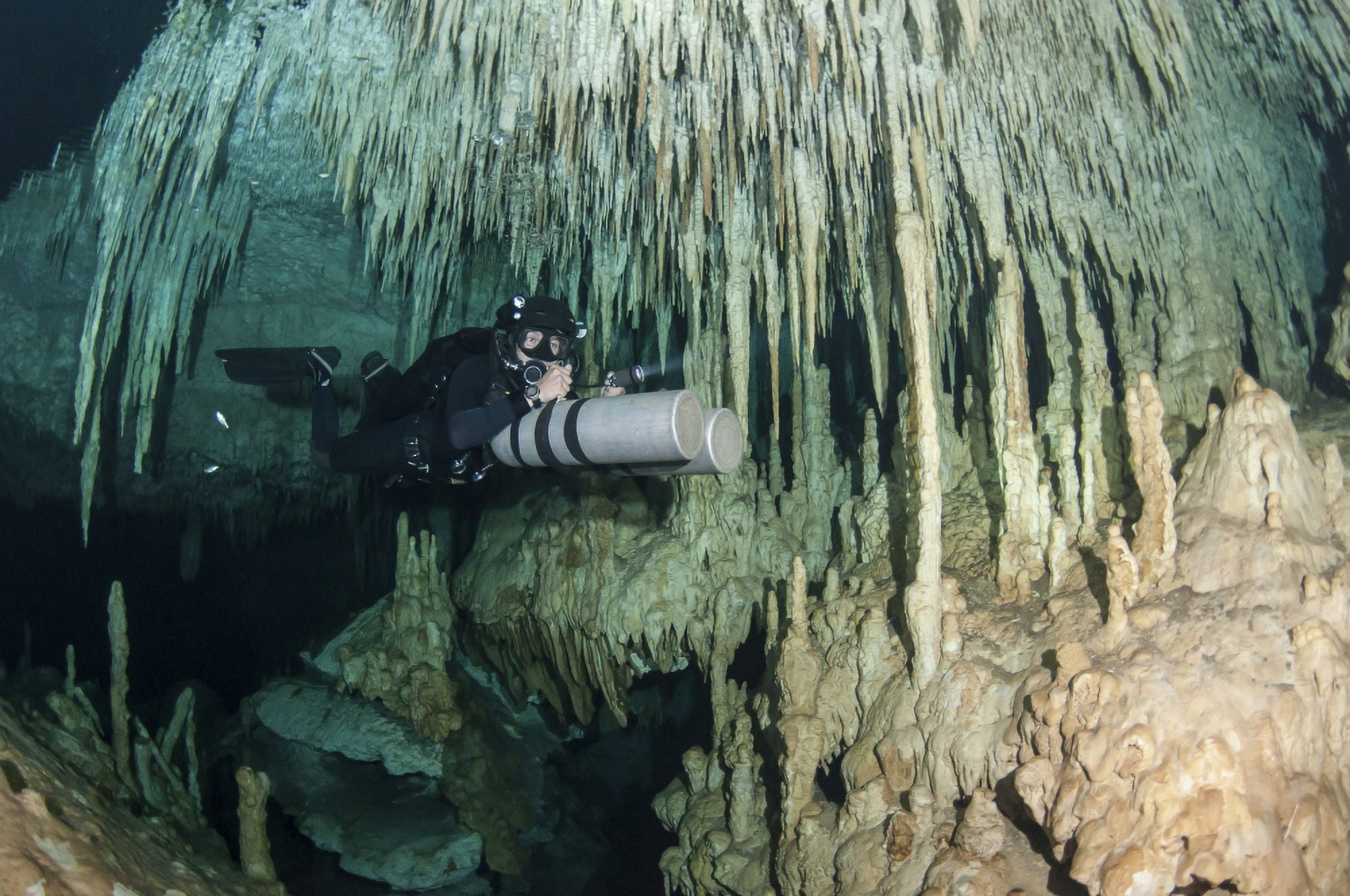 Diver using side mount gear in cave in Mexico Canvas Art - Karen DoodyStocktrek Images (35 x 23)