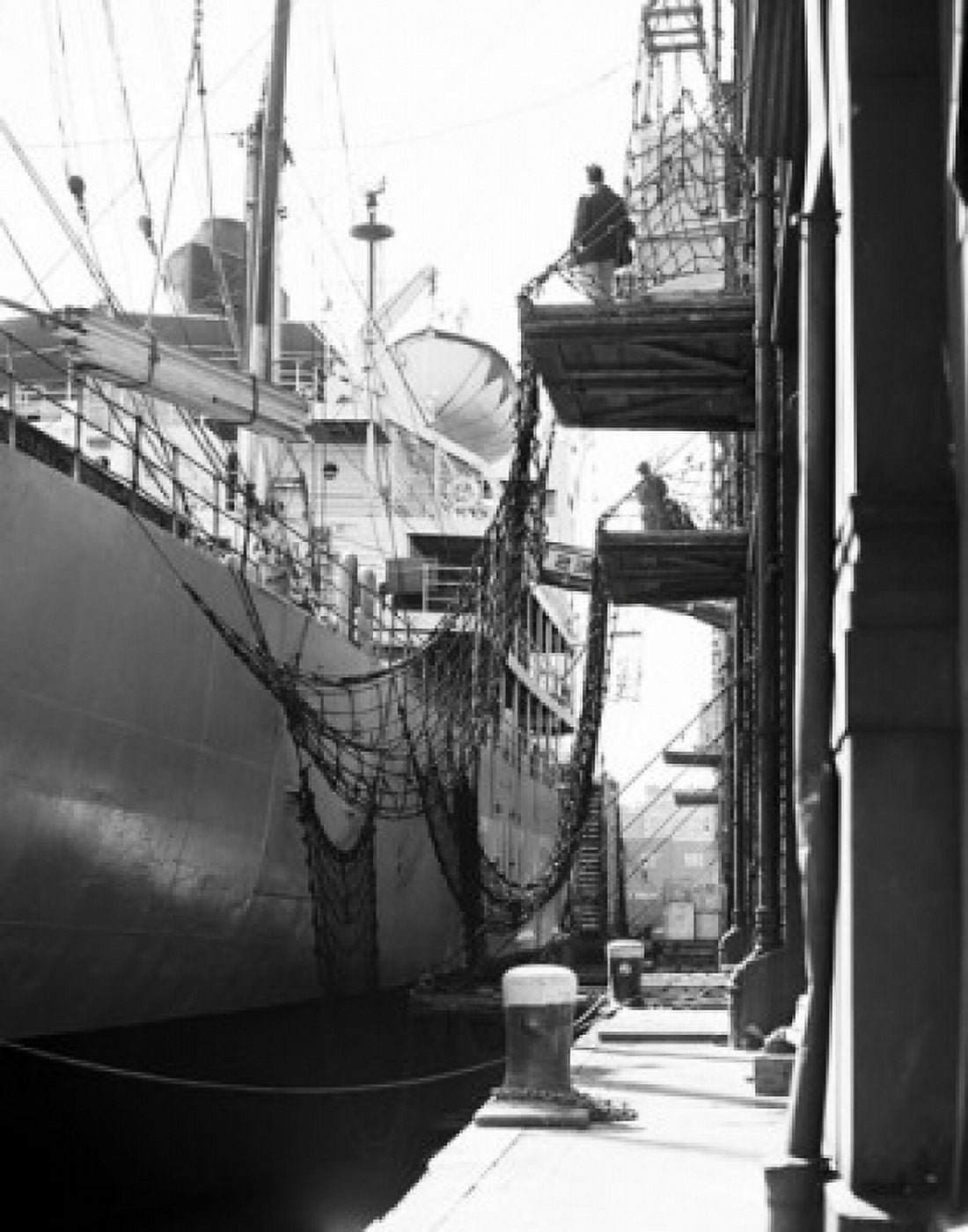 Dock workers working on a harbor Canvas Art - (18 x 24)