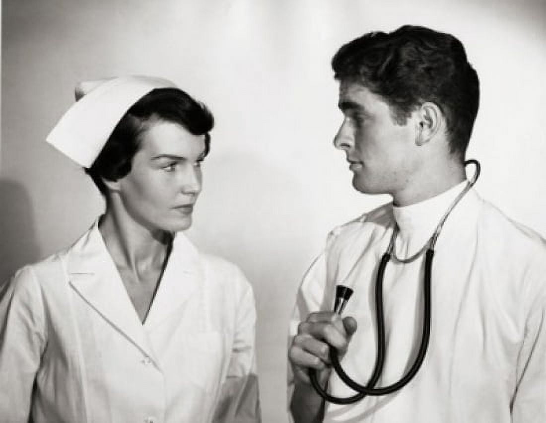Doctor and a female nurse looking at each other Canvas Art - (18 x 24)