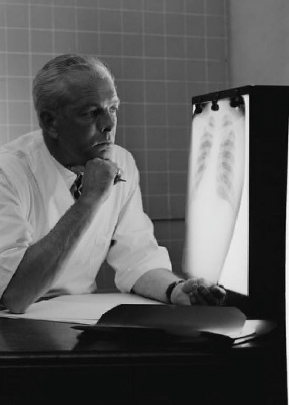 Doctor examining x-ray Canvas Art -  (24 x 36)