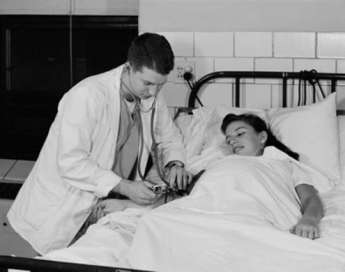 Doctor taking womans pulse Canvas Art - (24 x 36)