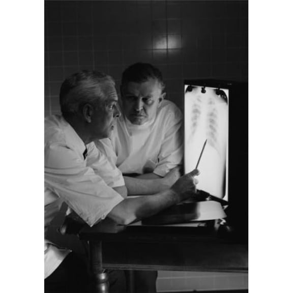 Doctors Examining X-Ray Poster Print - 18 x 24 in.