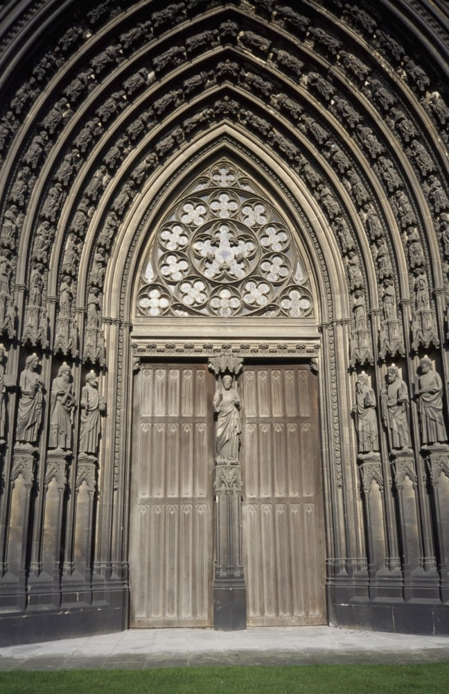 Doorway Of St Ouen Church Canvas Art - Chris Bradley Design Pics (24 x 38)