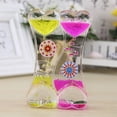 thumbnail image 1 of Double Heart Liquid Motion Bubbler Oil Drip Timer with Full Windmill Design, 3.4 oz Plastic Visual Sensory Desk Toy for Stress Relief and Home Office Decor., 1 of 3