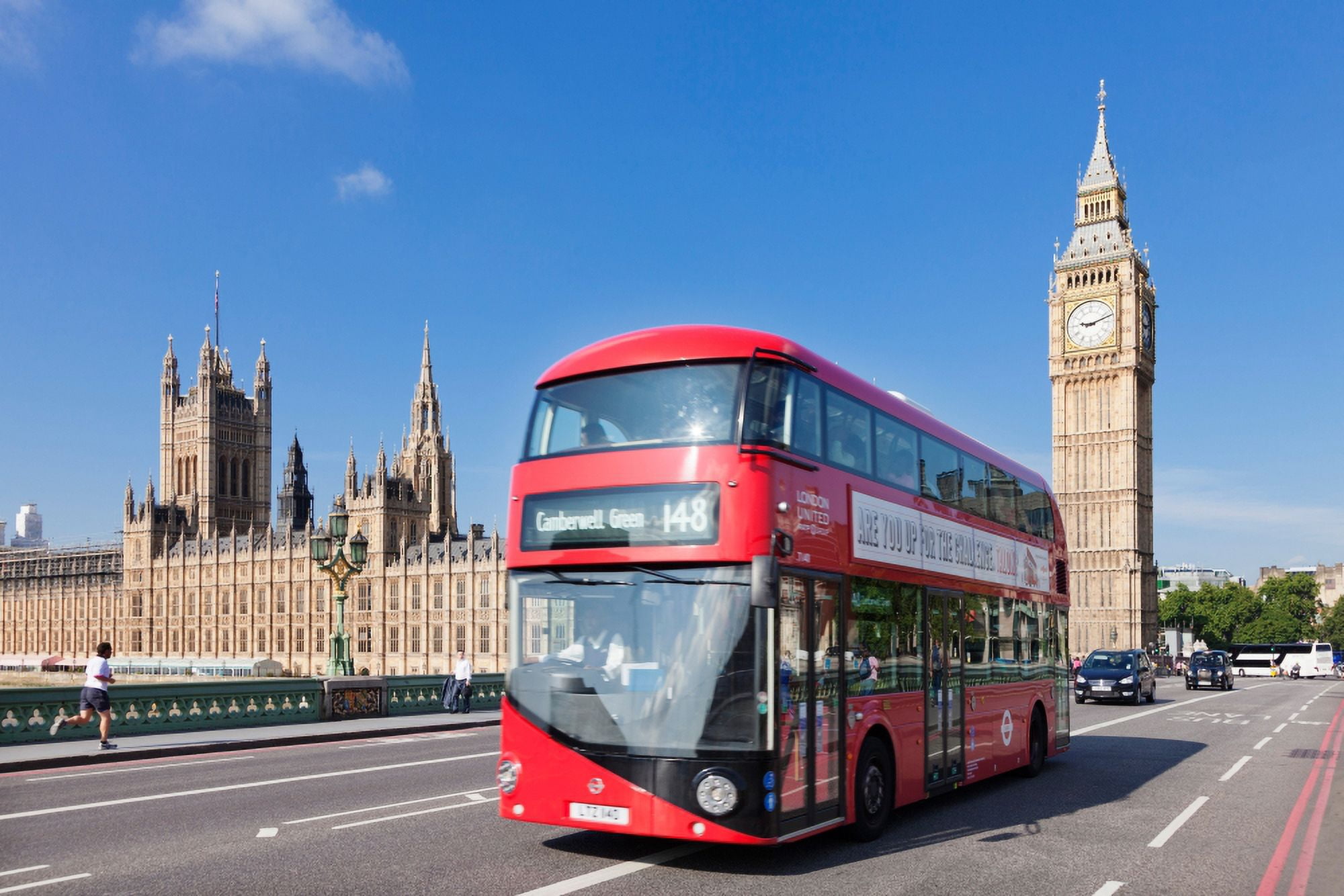 Double-decker bus moving on Westminster Bridge Big Ben Houses of Parliament City of Westminster London England Canvas Art - Panoramic Images (27 x 9)