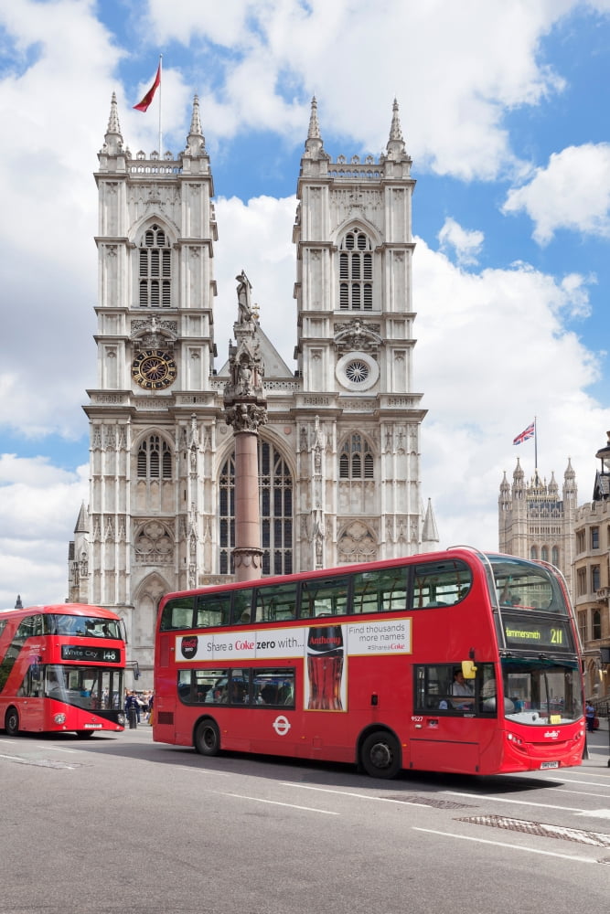 Double-decker buses passing by a cathedral Westminster Abbey City of Westminster London England Canvas Art - Panoramic Images (27 x 9)