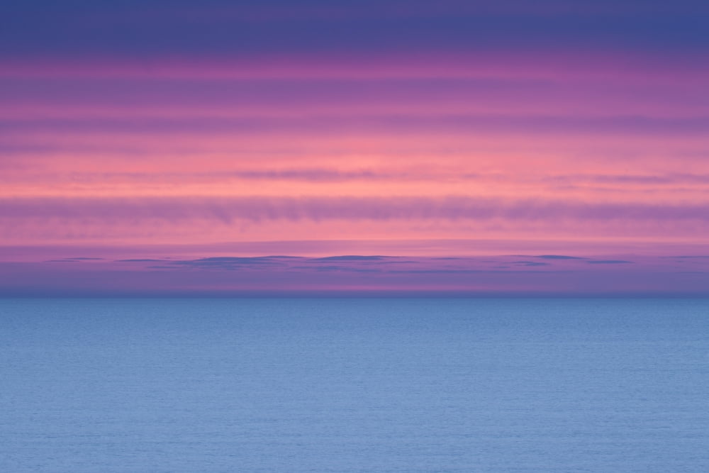 Dramatic Sky At Sunrise Over A Deserted Ocean Ireland Canvas Art - Peter McCabe Design Pics (38 x 24)