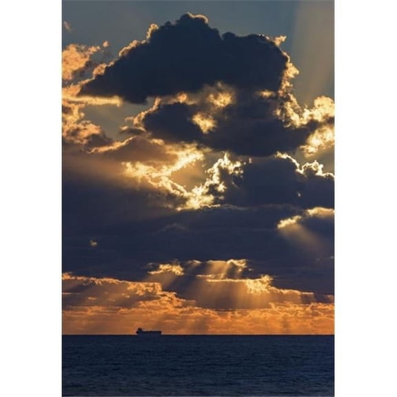 Dramatic Sky with Clouds Glowing At Sunset Over The Ocean & A Ship in The Poster Print by Ben Welsh - 12 x 18