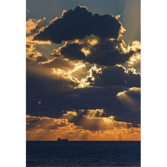 Dramatic Sky with Clouds Glowing At Sunset Over The Ocean & A Ship in The Poster Print by Ben Welsh - 12 x 18