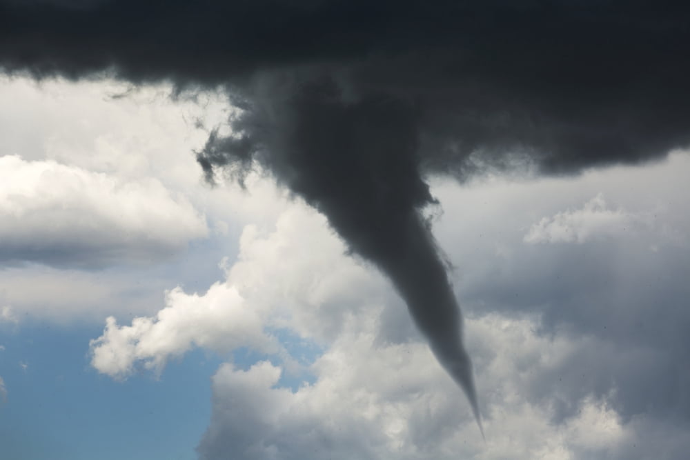 Dramatic funnel cloud created in dark storm clouds Calgary Alberta Canada Canvas Art - Michael Interisano Design Pics (19 x 12)