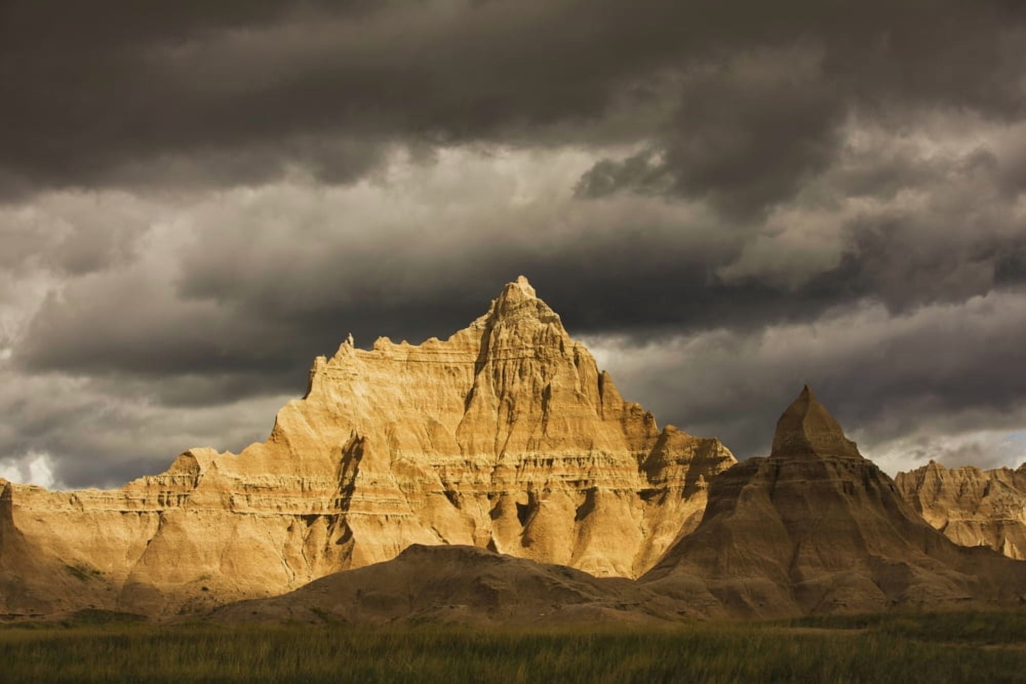 Dramatic light during a storm in badlands national park south dakota usa Canvas Art - Robert Postma Design Pics (19 x 12)