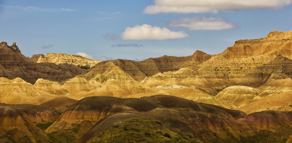 Dramatic light on the eroded formations of badlands national park south dakota united states of america Canvas Art - Robert Postma Design Pics (22 x 10)