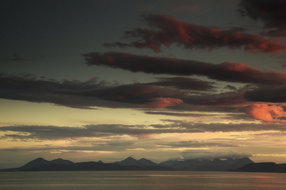 Dramatic sky at sunset over the oceanSkye scotland Canvas Art - John Short  Design Pics (38 x 24)