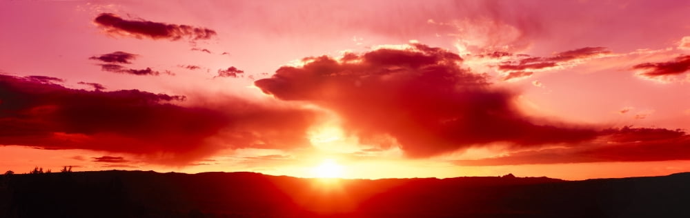 Dramatic sky over Arches National Park during sunset Utah USA Canvas Art - Panoramic Images (27 x 9)