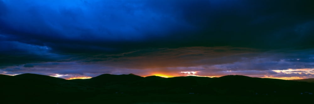 Dramatic sky over mountain range Tweeddale Scottish Borders Scotland Canvas Art - Panoramic Images (27 x 9)