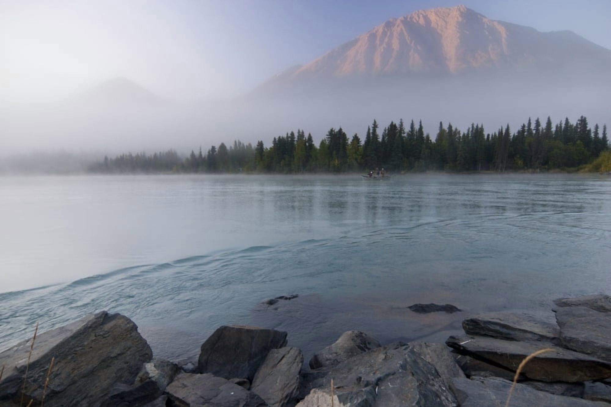 Drift Boat On The Outlet Of Kenai Lake Near Cooper Landing With Cecil Mountain Shrouded In Fog In The Background Canvas Art - Kent Fredriksson Design Pics (34 x 22)