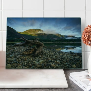 Driftwood Cutting Board, Landscape of a Mountain Lake and Cloudy Sky Driftwood on Rocky Shoreline, Decorative Tempered Glass Cutting and Serving Board, Large Size, Blue and Brown, by Ambesonne