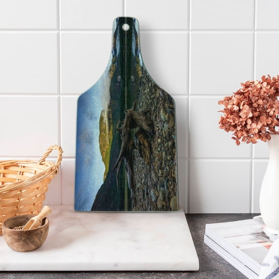 Driftwood Cutting Board, Landscape of a Mountain Lake and Cloudy Sky Driftwood on Rocky Shoreline, Decorative Tempered Glass Cutting and Serving Board, Wine Bottle Shape, Blue and Brown, by Ambesonne