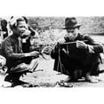 thumbnail image 1 of Drug Seller Openly Weighing Opium For A Customer In An Outdoor Market In Laos. 1954. History, 1 of 1
