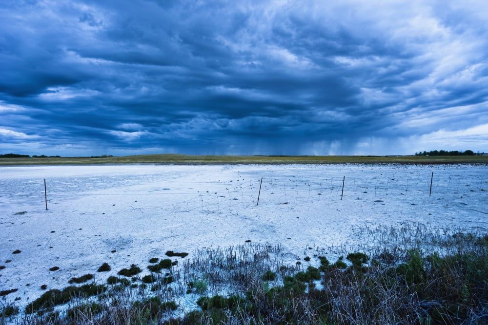 Dry Salt Lake And Clouds At Dusk Near Mortlach Saskatchewan Canvas Art - Yves Marcoux Design Pics (34 x 22)