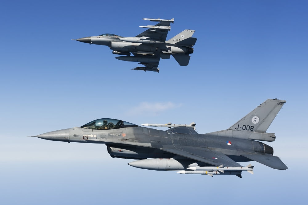 Dutch F-16AMs during a combat air patrol sortie over the Mediterranean Sea Canvas Art - Gert KromhoutStocktrek Images (35 x 24)