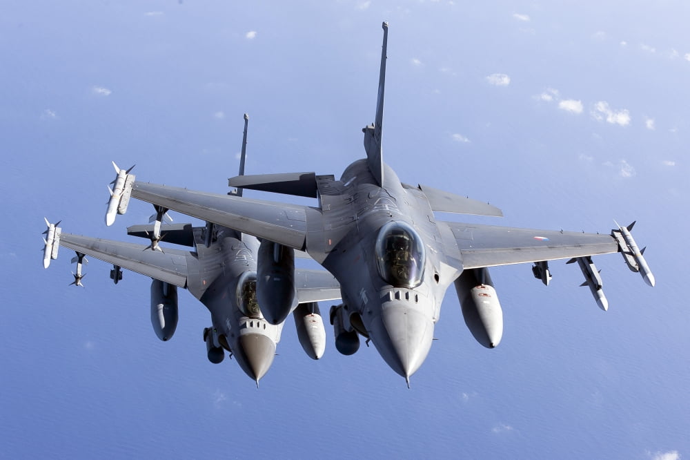 Dutch F-16AMs during a combat air patrol sortie over the Mediterranean Sea Canvas Art - Gert KromhoutStocktrek Images (35 x 24)