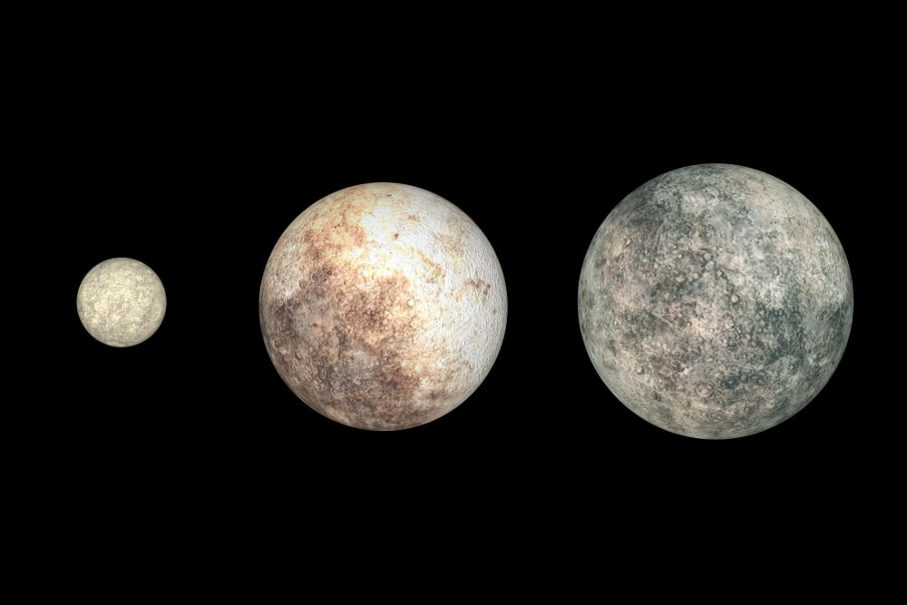 Dwarf planets Ceres Pluto and Eris Canvas Art - Walter MyersStocktrek Images (18 x 12)