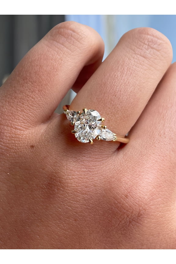 2.5ct Oval Lab-Grown Diamond Three-Stone Engagement Ring with Pear-Shaped Side Stones in 14K Yellow Gold for Women – Available in US 5.5.