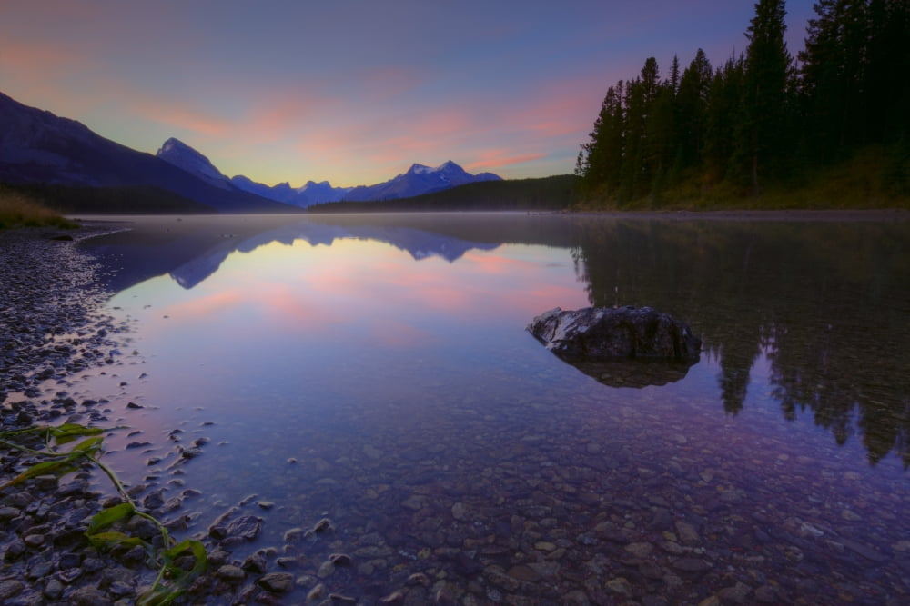 Early Morning On A Fog Covered Maligne Lake In Jasper National Park In The Canadian Rockies During The Autumn Alberta Canvas Art - Dan Jurak Design Pics (17 x 11)