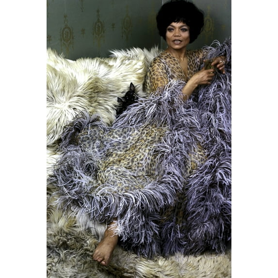 Eartha Kitt wearing a fur and animal print robe Photo Print (24 x 30)
