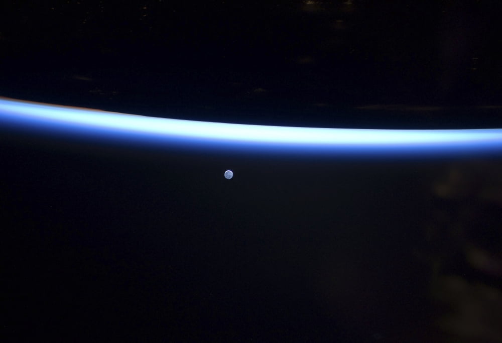 Earths thin line of atmosphere and a gibbous moon Canvas Art - Stocktrek Images (34 x 24)