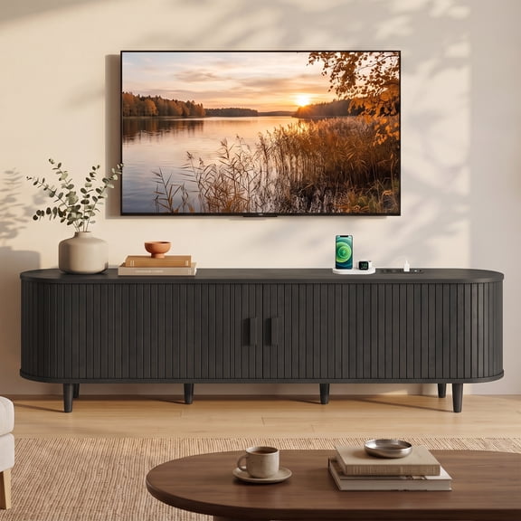 Easoger 70" Sliding Door TV Stand with Charging Station, Fluted Vertical Grille Wood Entertainment Center, Curved Oval Shape Storage Cabinet,Black