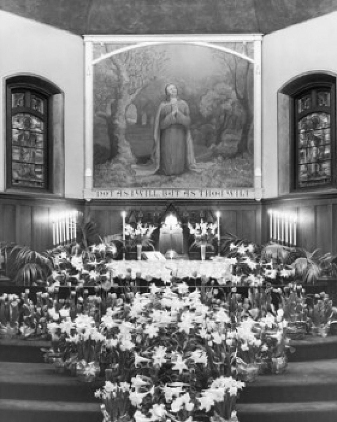 Easter Lilies and burning candles in a church Canvas Art - (24 x 36)