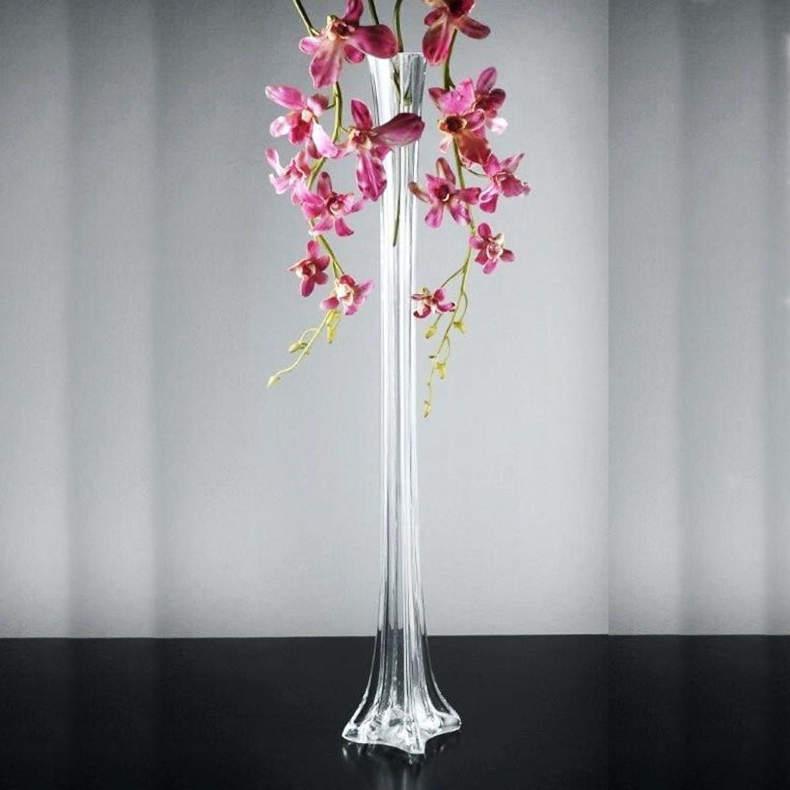 Guest table centerpiece on Eiffel Tower vase with white dendrobium