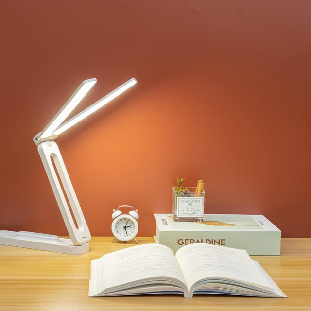 Efficient portable and rechargeable mini desk lamp in white with a large lighting range Ideal